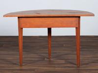 A Country Reddish Brown Painted Pine Demi-Lune Console Table