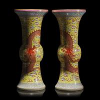 A Pair of Chinese Yellow Ground Finely Decorated Famille Rose 'Dragon' Vases 黃地粉彩雲龍紋花觚一對