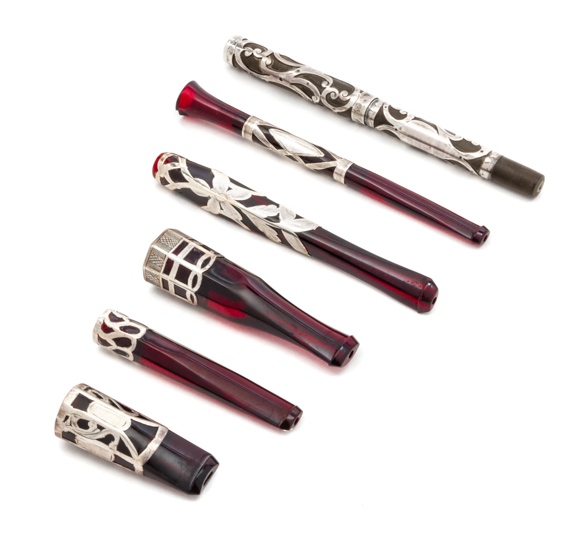 Six Silver Overlay Tobacco Holders Length of longest 5 1/5 inches.