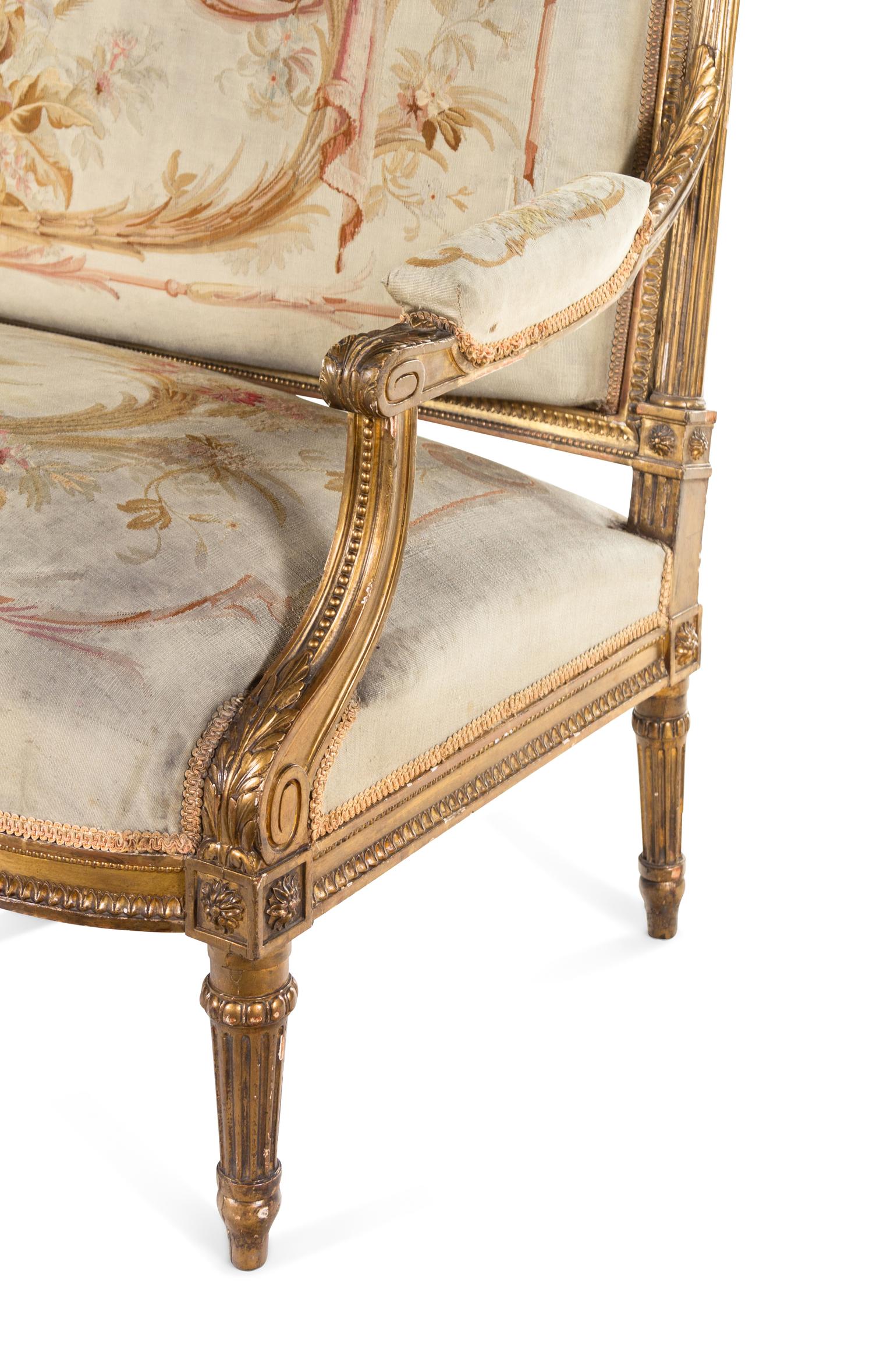 A Louis XVI Style Carved Giltwood Five-Piece Parlor Suite