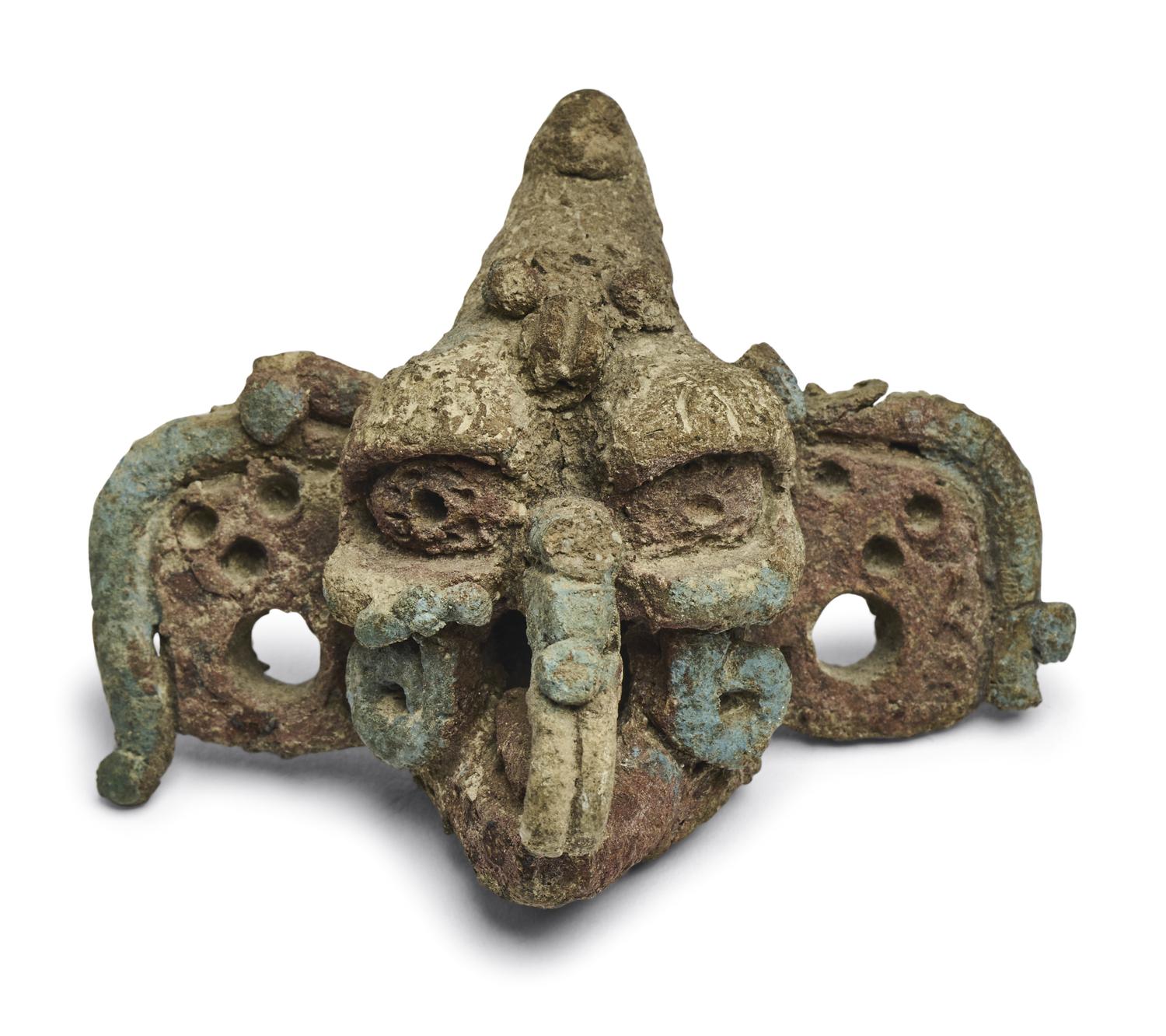 A Maya Polychrome Terracotta Head of a Deity