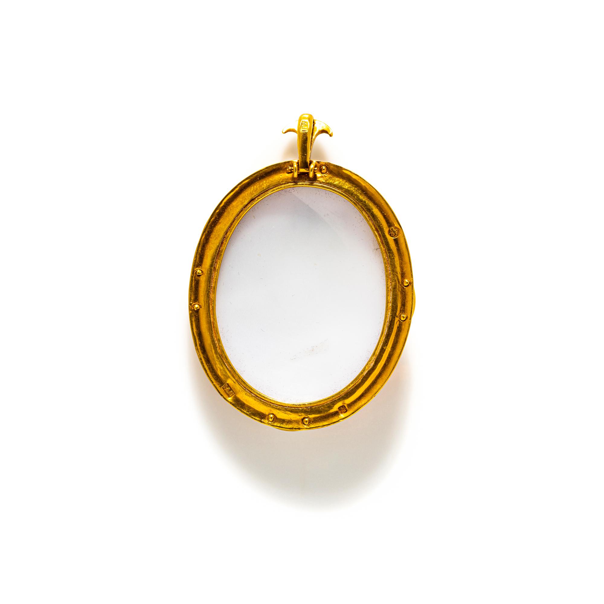 A Neoclassical Gold and Shell Cameo Pendant with Saint George Slaying the Dragon
