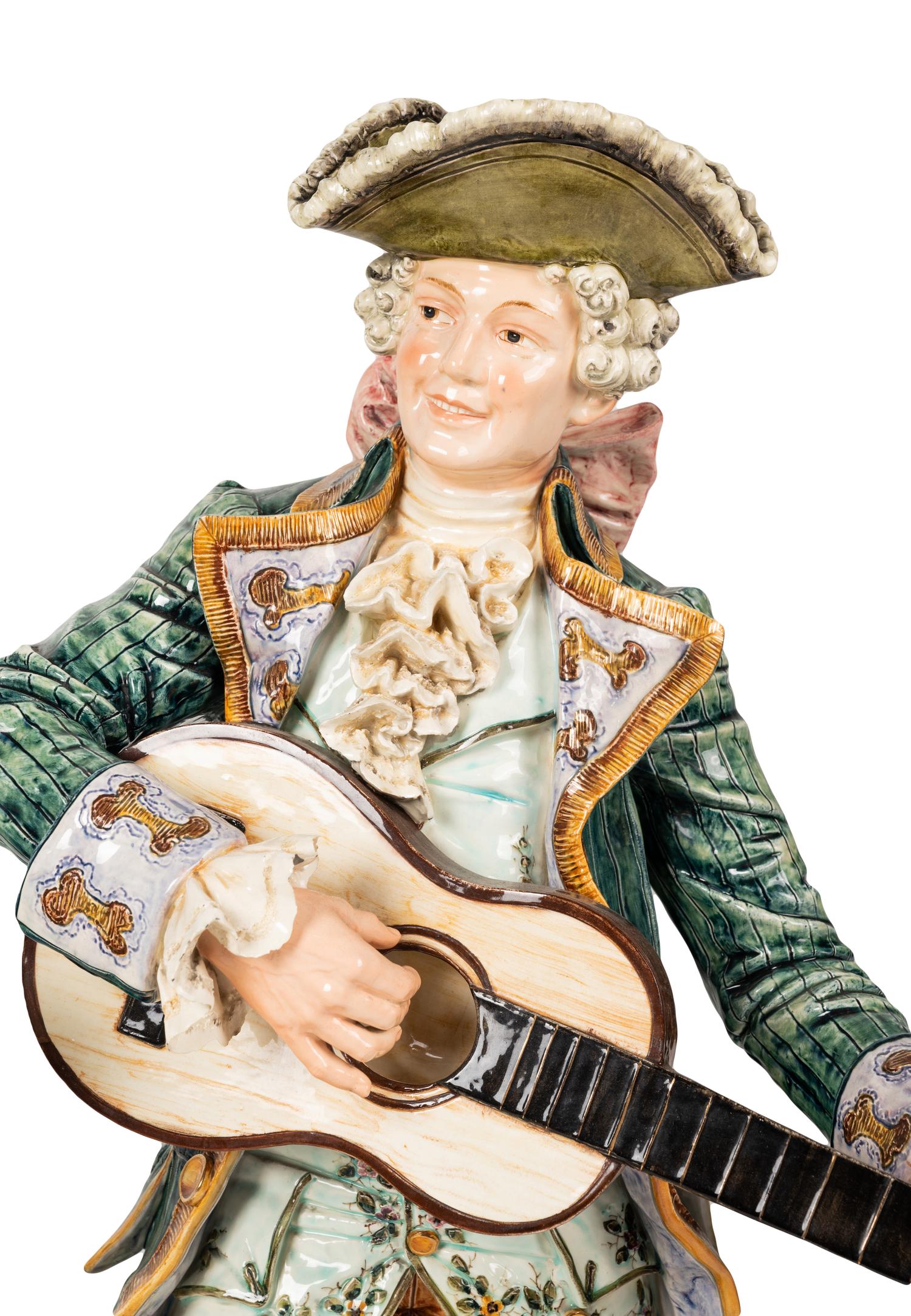 A Pair of Continental Majolica Figures