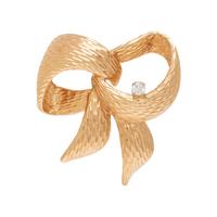 HENRY DANKNER, YELLOW GOLD AND DIAMOND BOW BROOCH