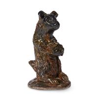 Glazed redware figure of a seated bear Robert Stauffer, late 20th century
