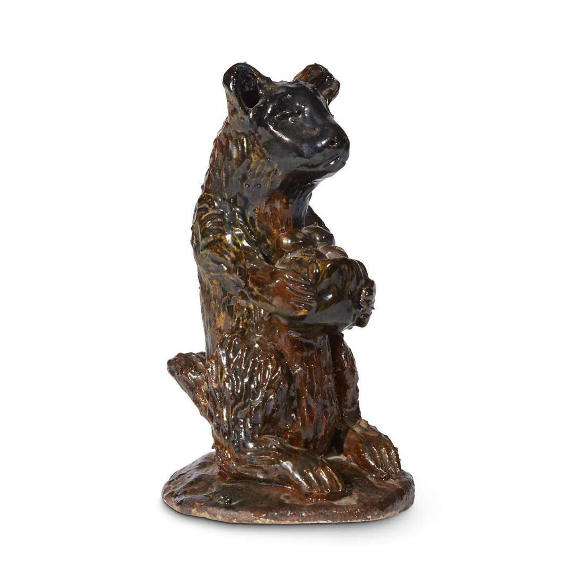Glazed redware figure of a seated bear Robert Stauffer, late 20th century