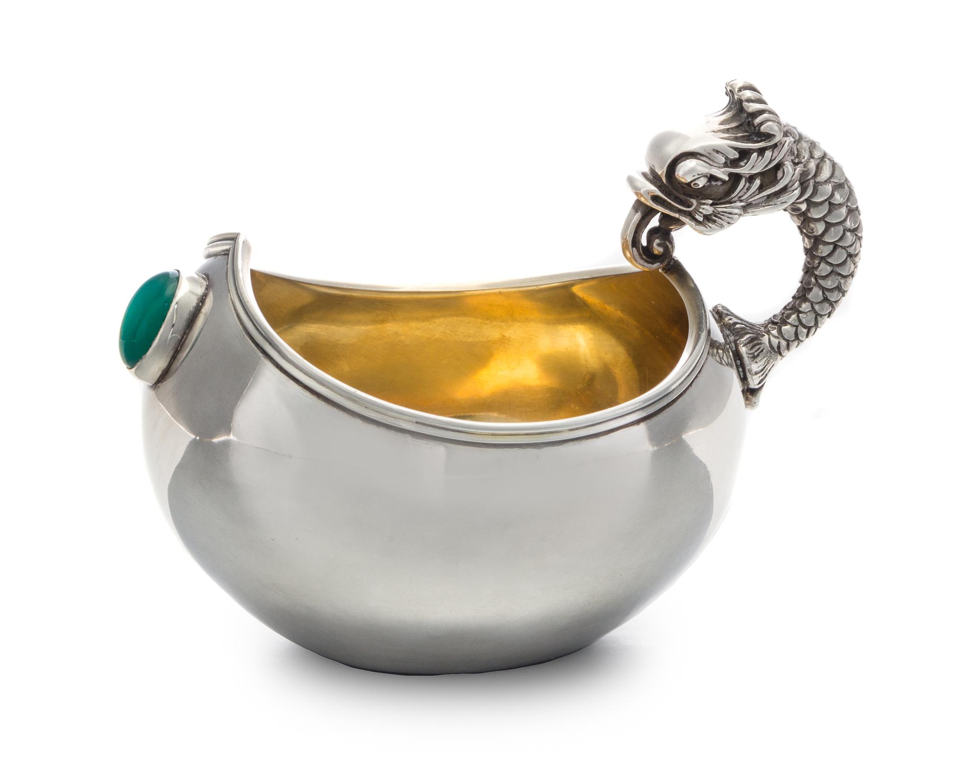 A Russian Enameled Silver Kovsh, Spurious Faberge Mark Overstriking Maker's Mark, Late 19th/Early 20th Century, the body inset with a g