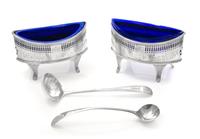 A Pair of George III Reticulated Silver Salt Cellars, Peter and Ann Bateman and George Gray, London, 1791, each of oblong form, worked