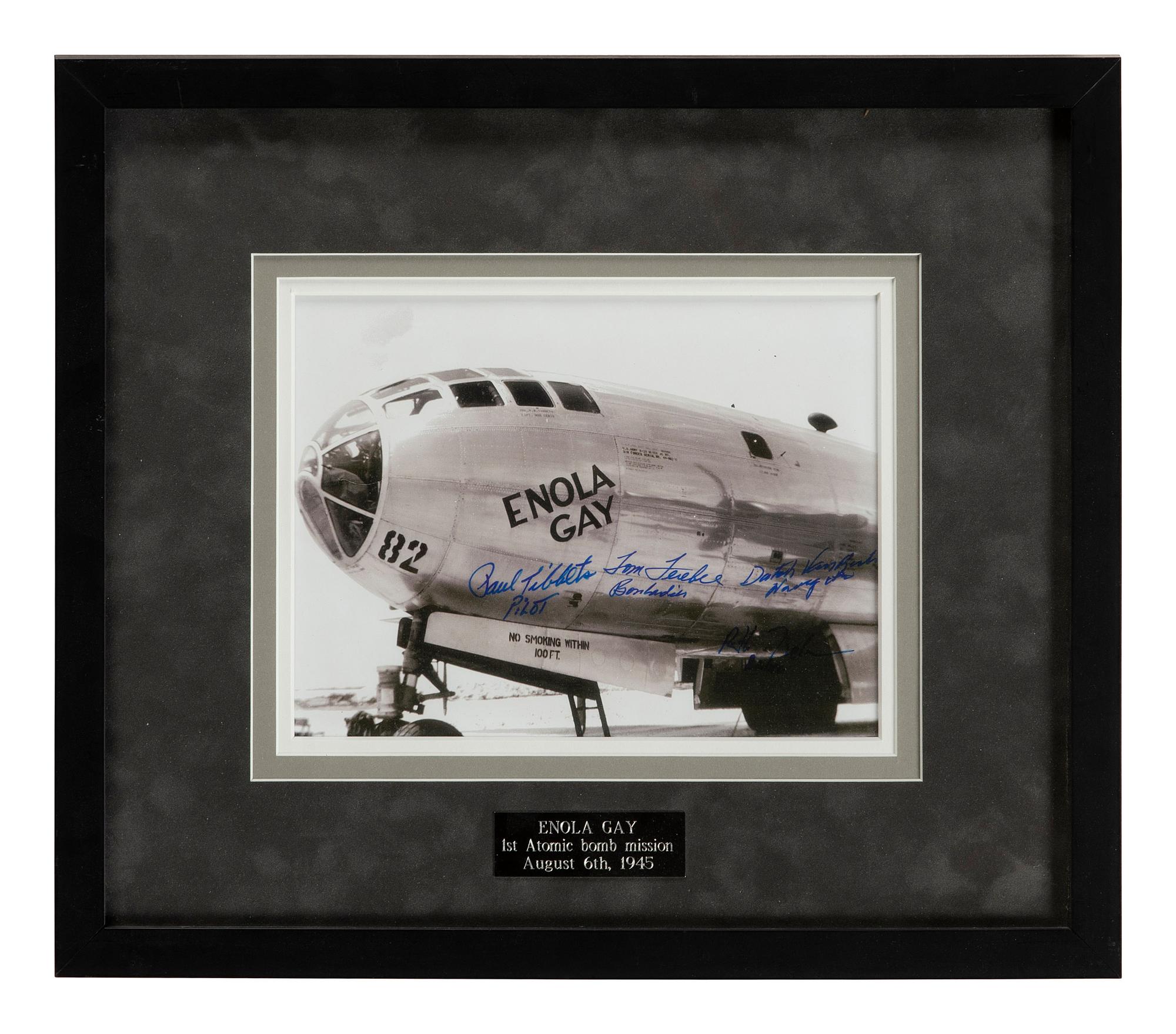 [WORLD WAR II]. Photograph of the Enola Gay , signed by 4 crew members.