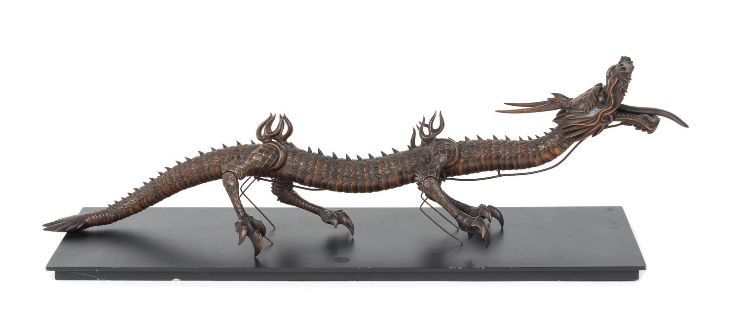 An Articulated Wood Figure of a Dragon Length 28 inches. — 19TH CENTUTY