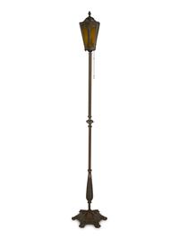 A Pair of Patinated Metal Lantern Style Floor Lamps