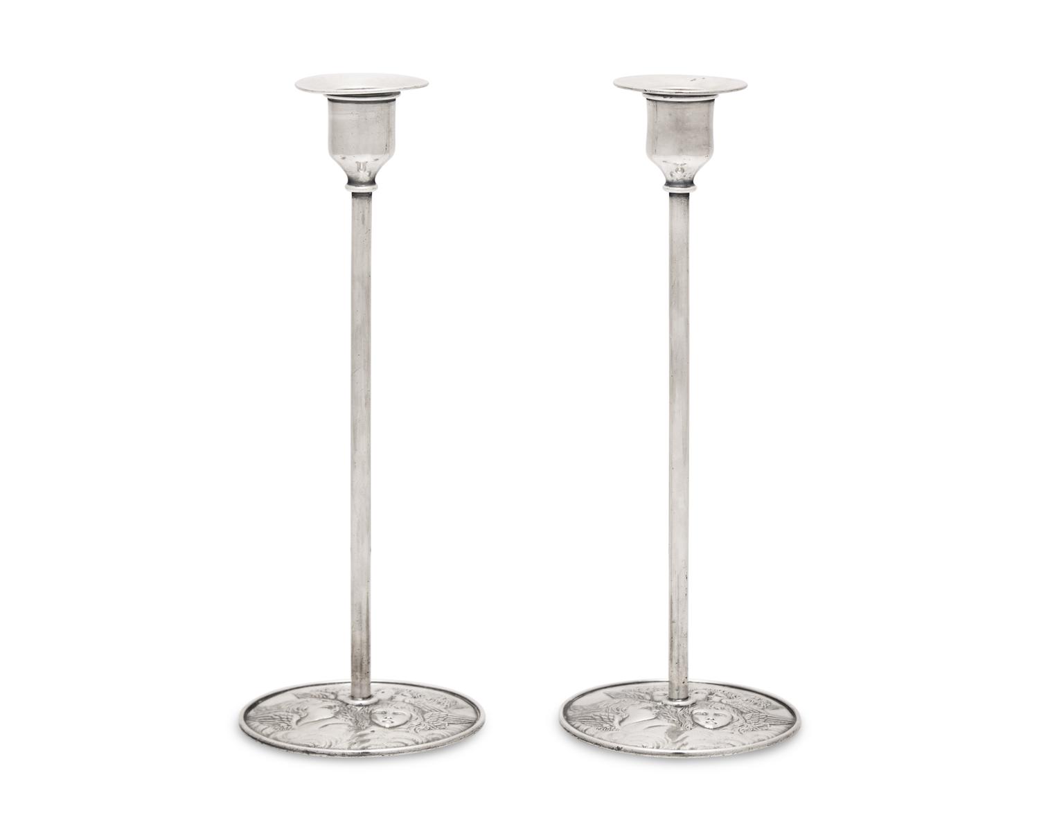 A Pair of Arts & Crafts Sterling Silver Candlesticks