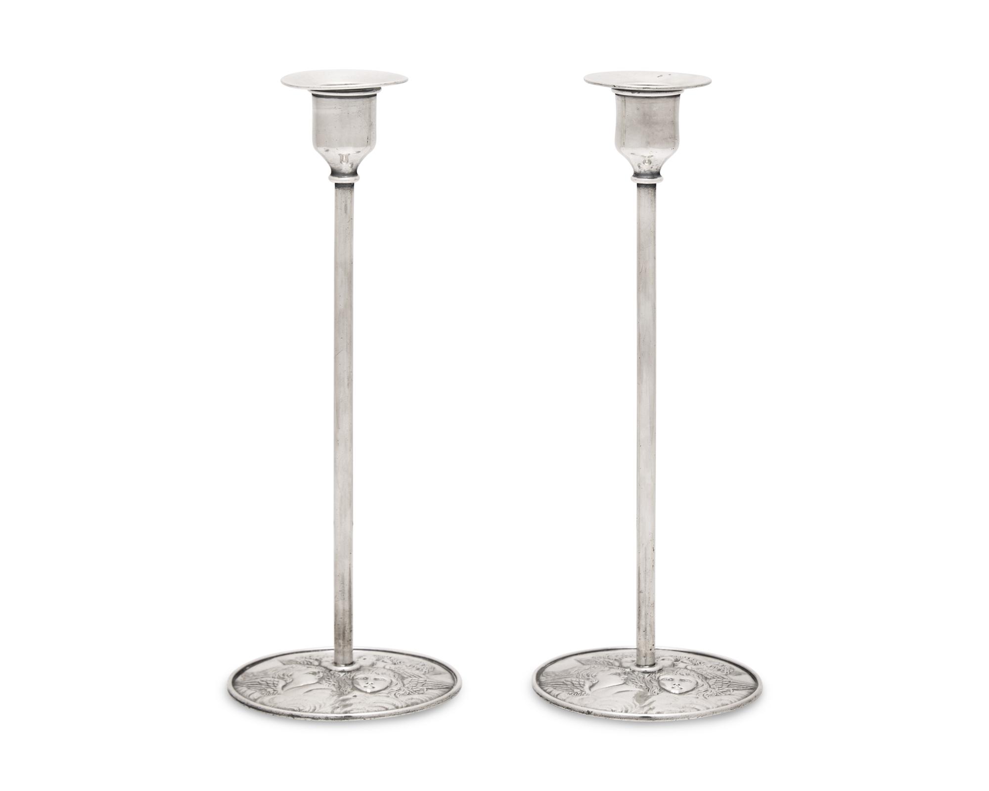 A Pair of Arts & Crafts Sterling Silver Candlesticks
