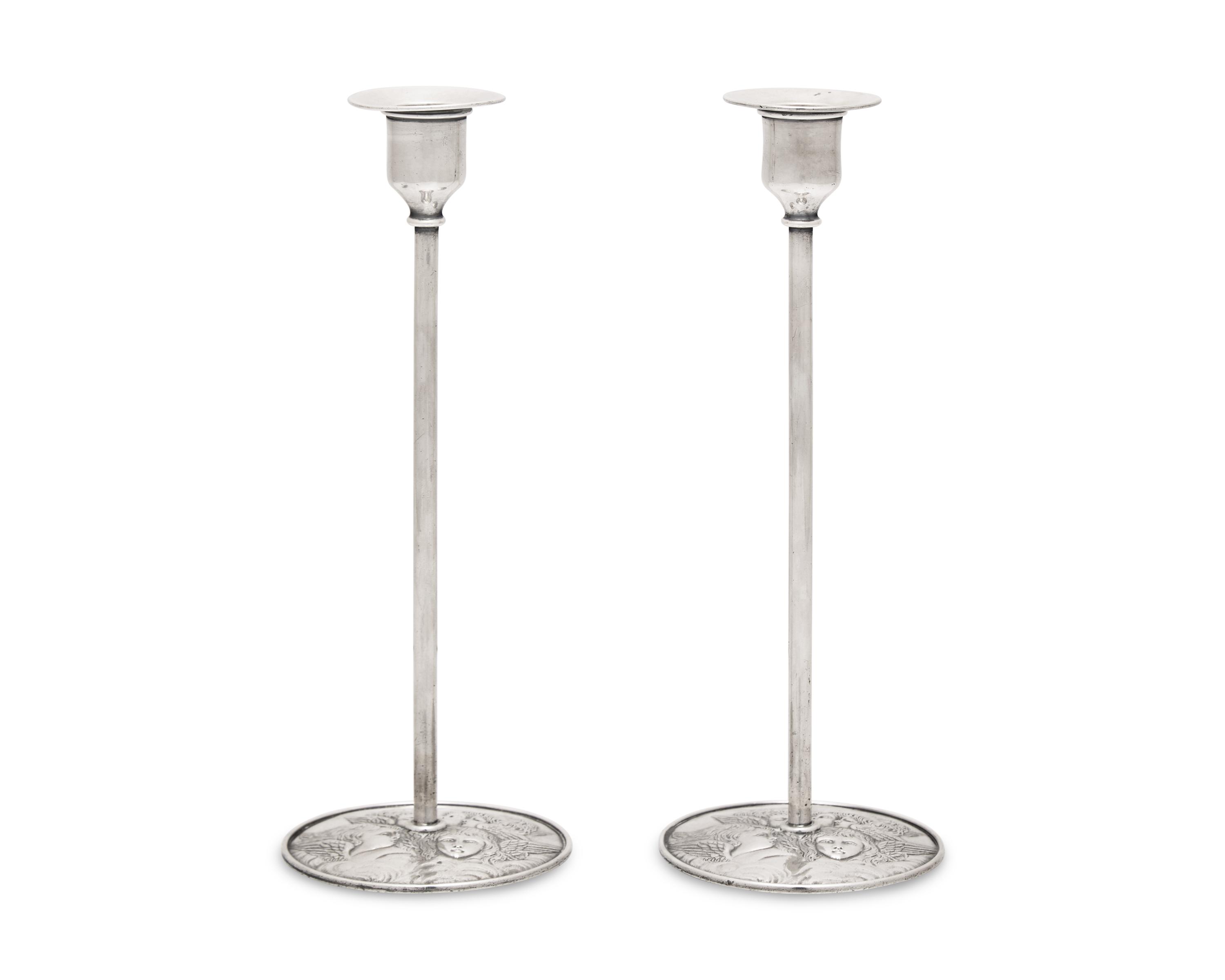 A Pair of Arts & Crafts Sterling Silver Candlesticks