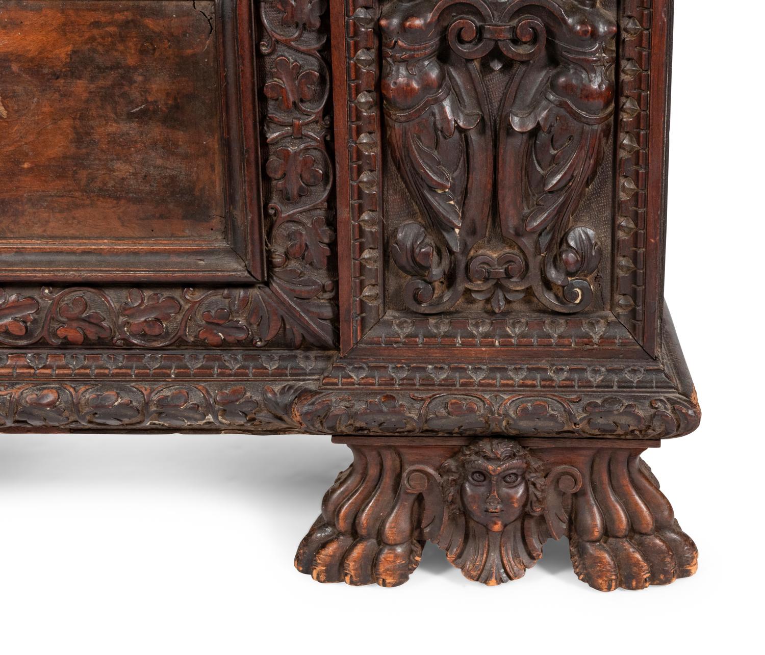 An Italian Carved Walnut Cassone