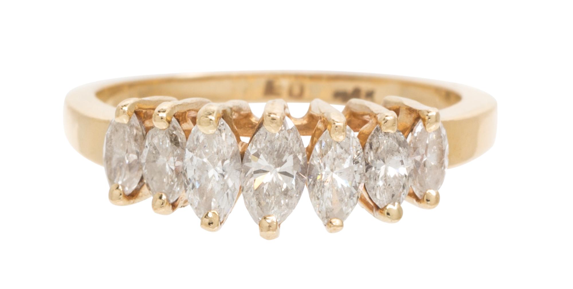 A 14 Karat Yellow Gold and Diamond Ring, 2.10 dwts.
