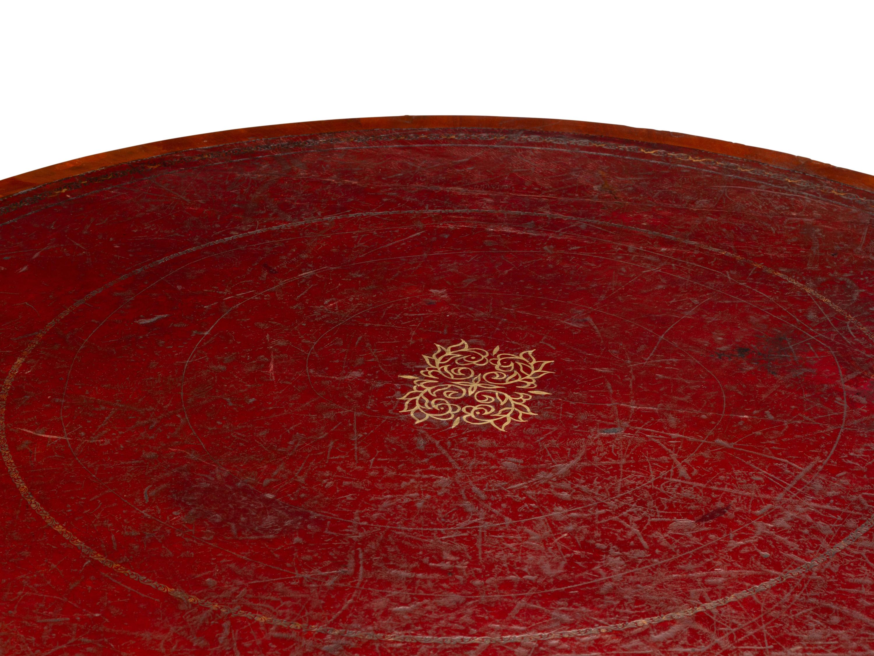 A Victorian Mahogany and Parcel Gilt "Rent" Table