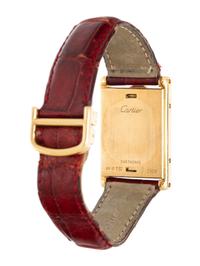 CARTIER, REF. 2506 18K YELLOW GOLD AND FACTORY DIAMOND 'TANK BASCULANTE' WATCH WITH CARTIER DEPLOYANT BUCKLE