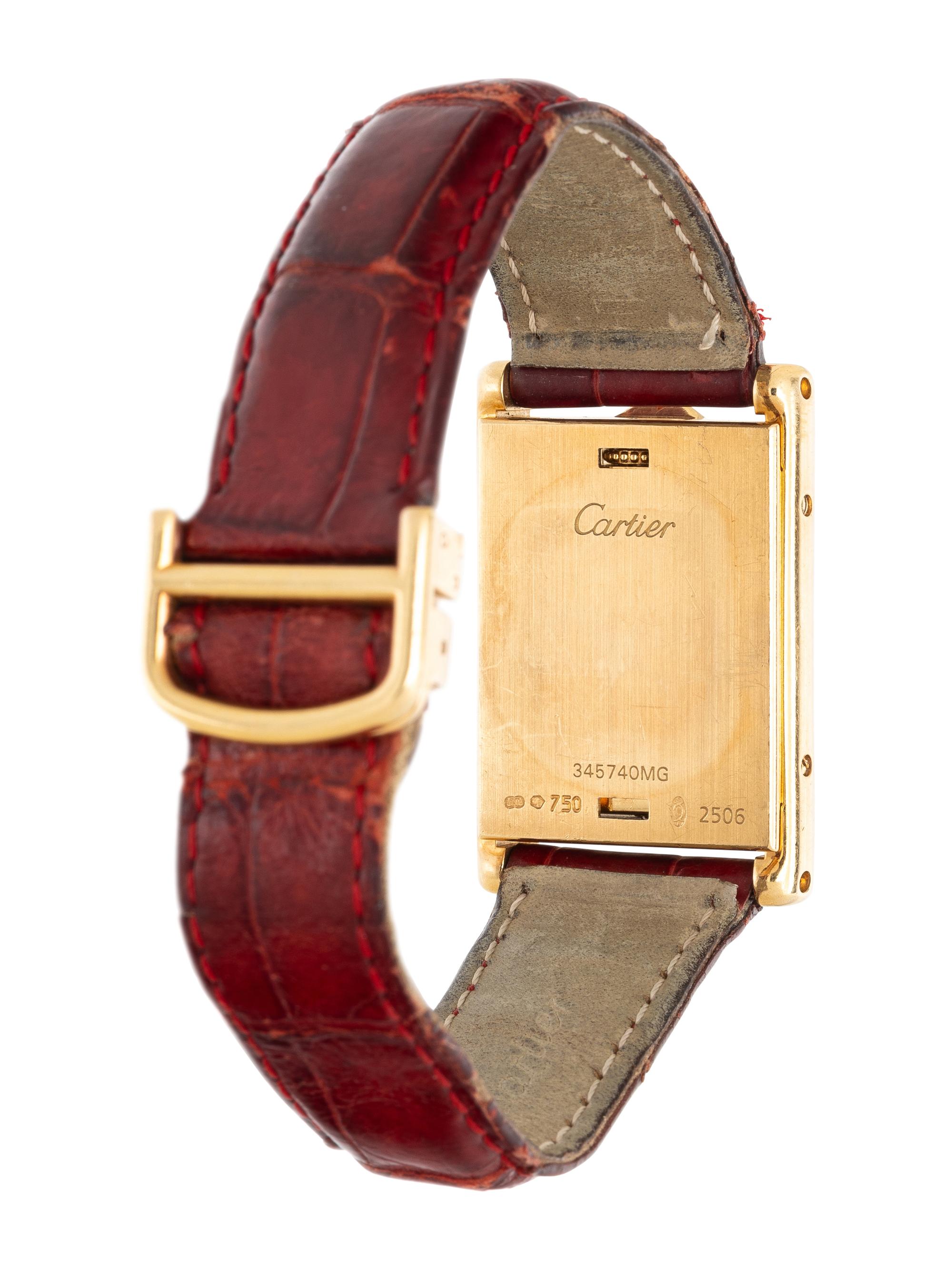 CARTIER, REF. 2506 18K YELLOW GOLD AND FACTORY DIAMOND 'TANK BASCULANTE' WATCH WITH CARTIER DEPLOYANT BUCKLE