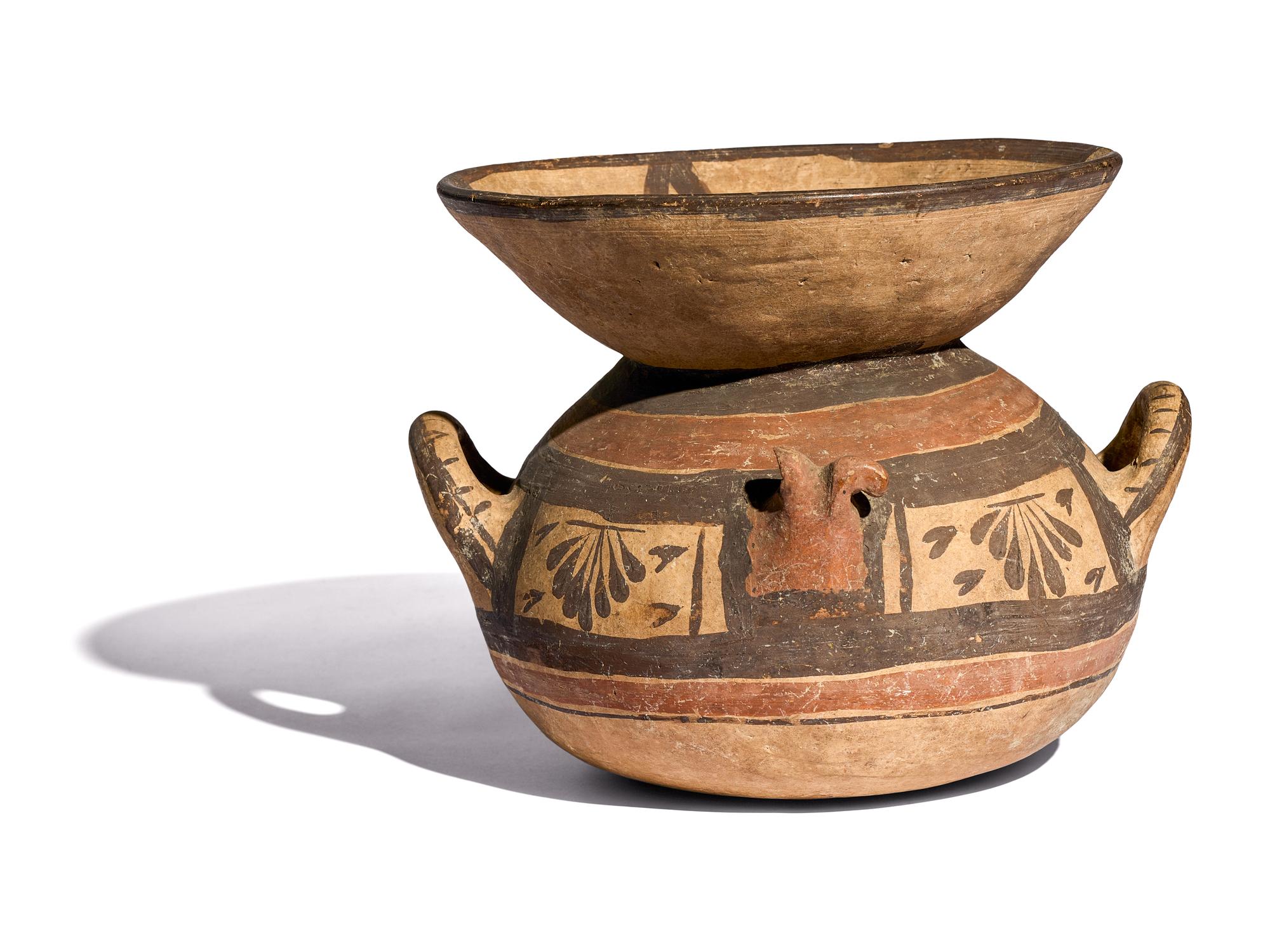 A Daunian Painted Terracotta Funnel Krater