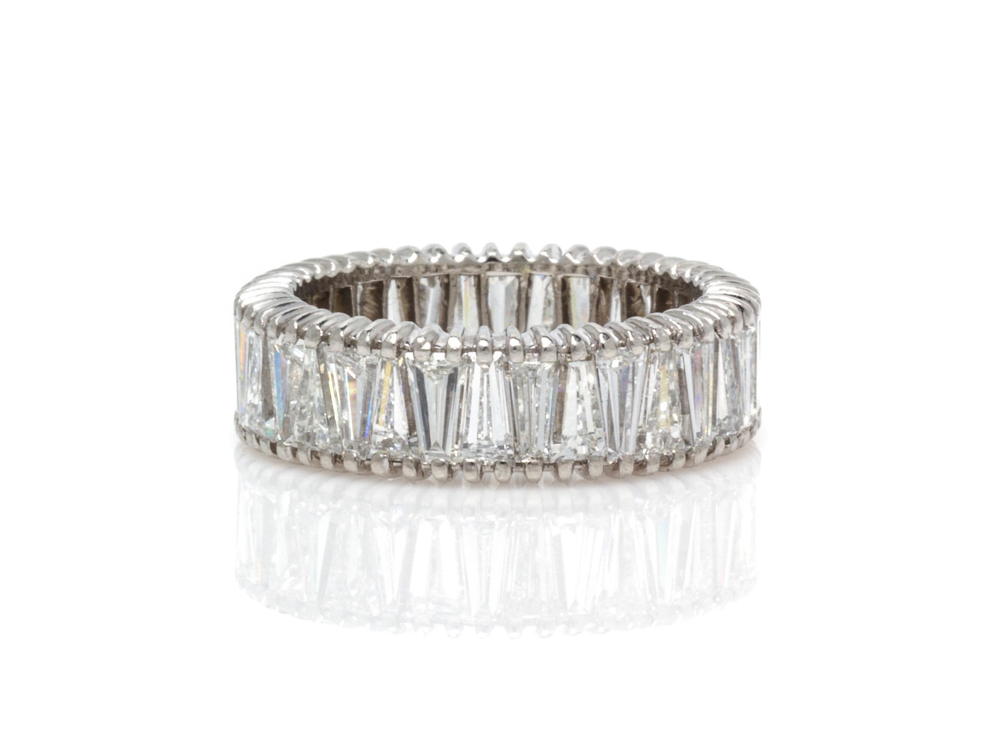 A White Gold and Diamond Eternity Band, 4.30 dwts.