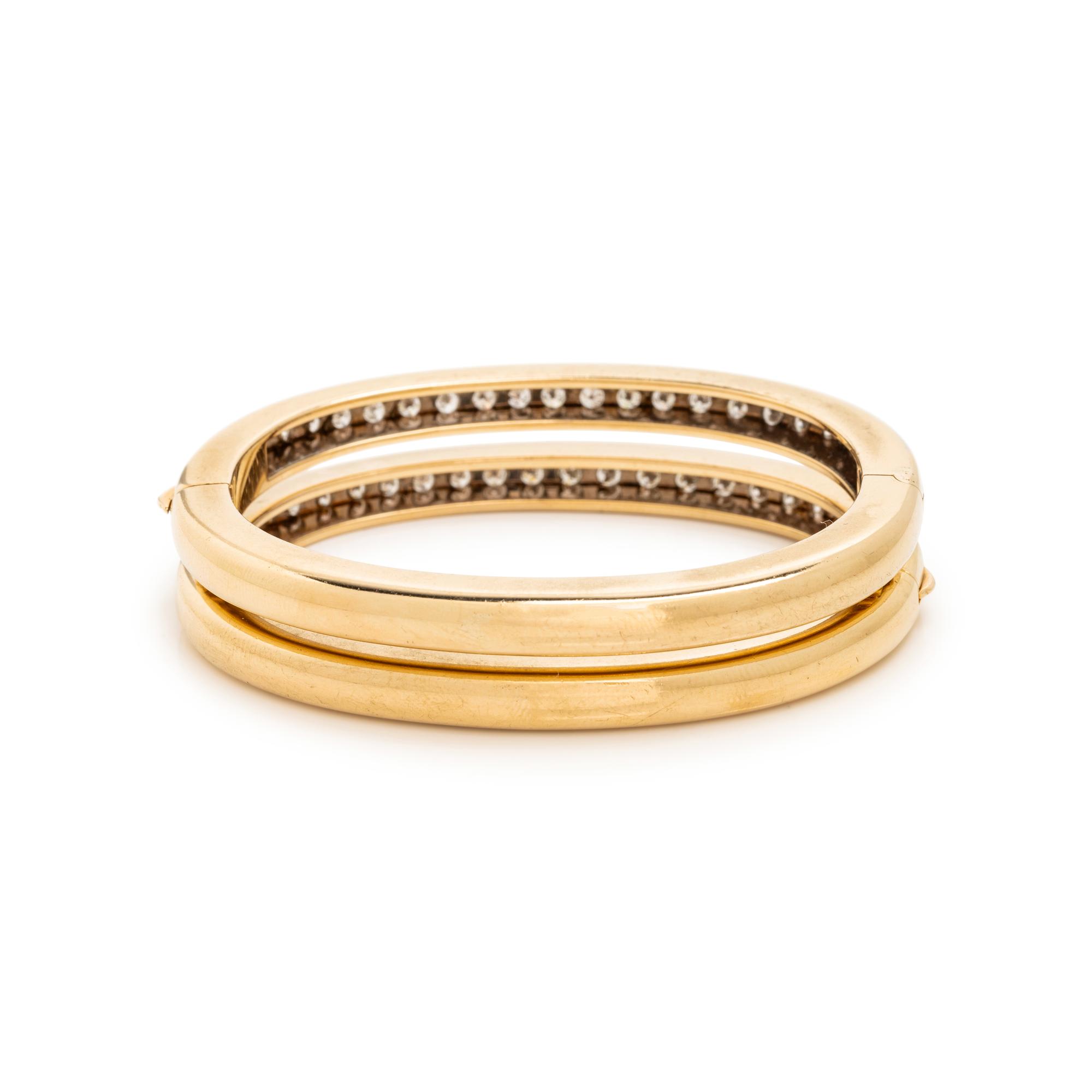 PAIR OF BICOLOR GOLD AND DIAMOND BANGLE BRACELETS