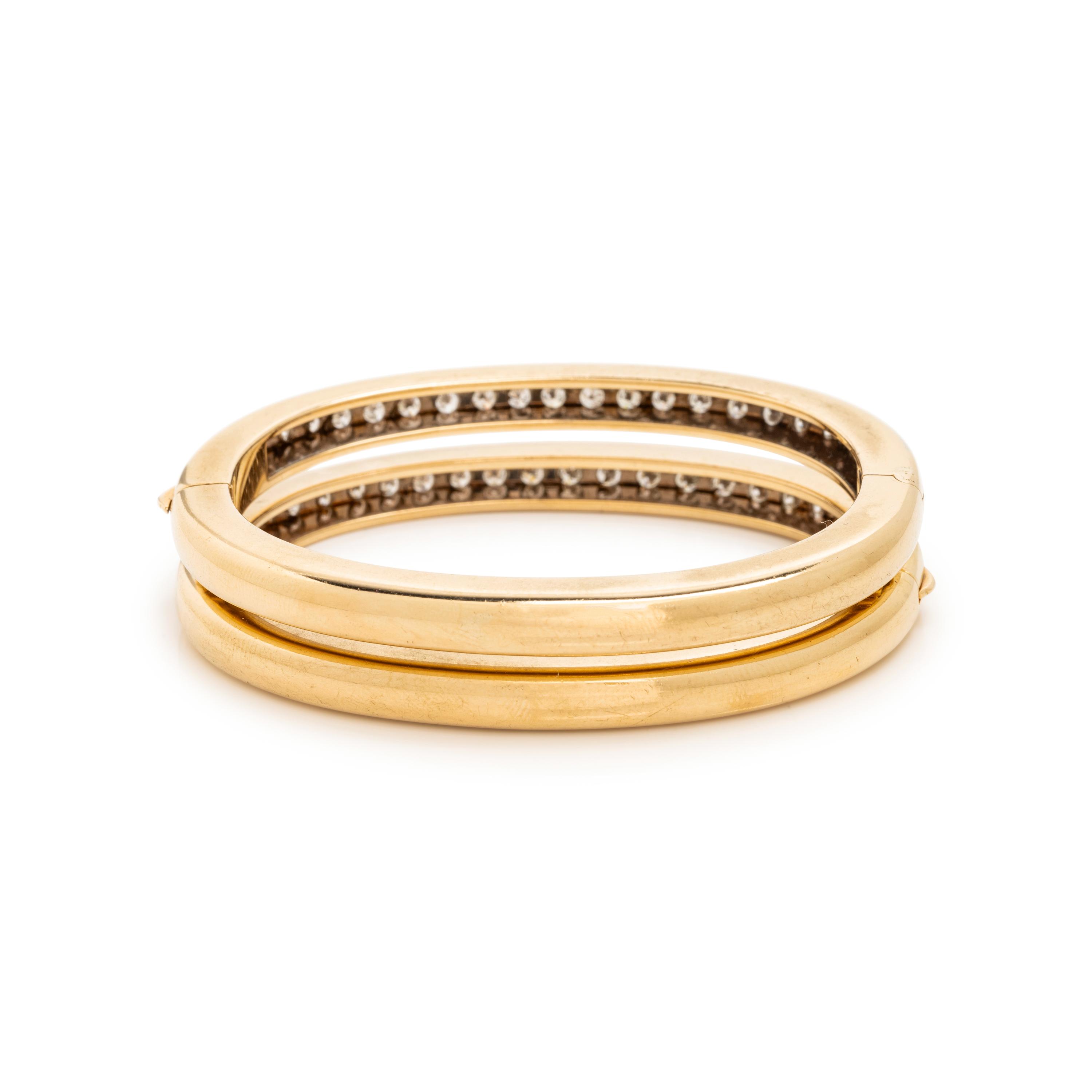 PAIR OF BICOLOR GOLD AND DIAMOND BANGLE BRACELETS