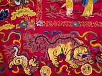 An Impressively Large Chinese Burgundy Ground Embroidered Silk 'Birthday' Wall Panel, Dated 1868 清同治七年（1868） 絳紅緞綉賀壽圖大挂屏