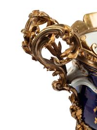 A Pair of Gilt Bronze Mounted Sèvres Style Porcelain Cache Pots