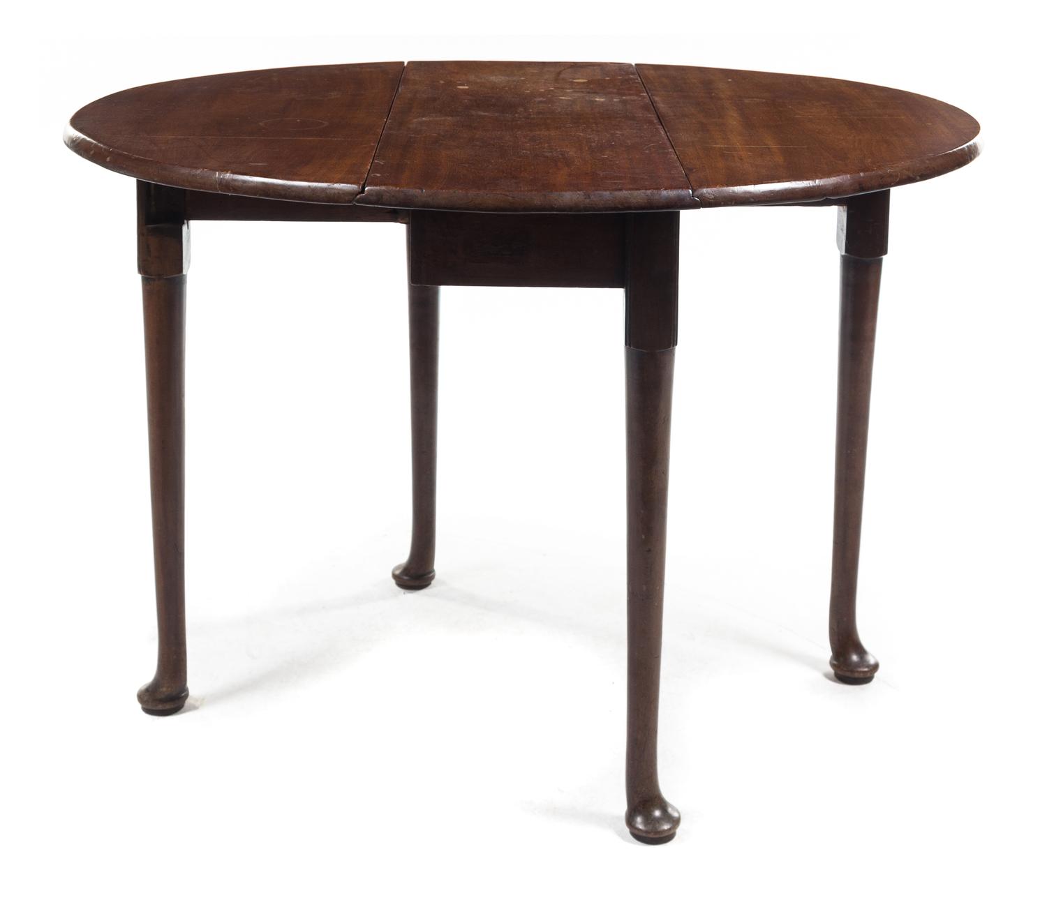 A Queen Anne Mahogany Drop-Leaf Table Height 28 x width 36 x depth 13 3/4 inches (closed). — 19TH CENTURY