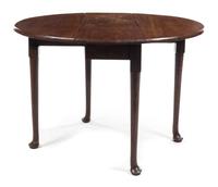 A Queen Anne Mahogany Drop-Leaf Table Height 28 x width 36 x depth 13 3/4 inches (closed). — 19TH CENTURY