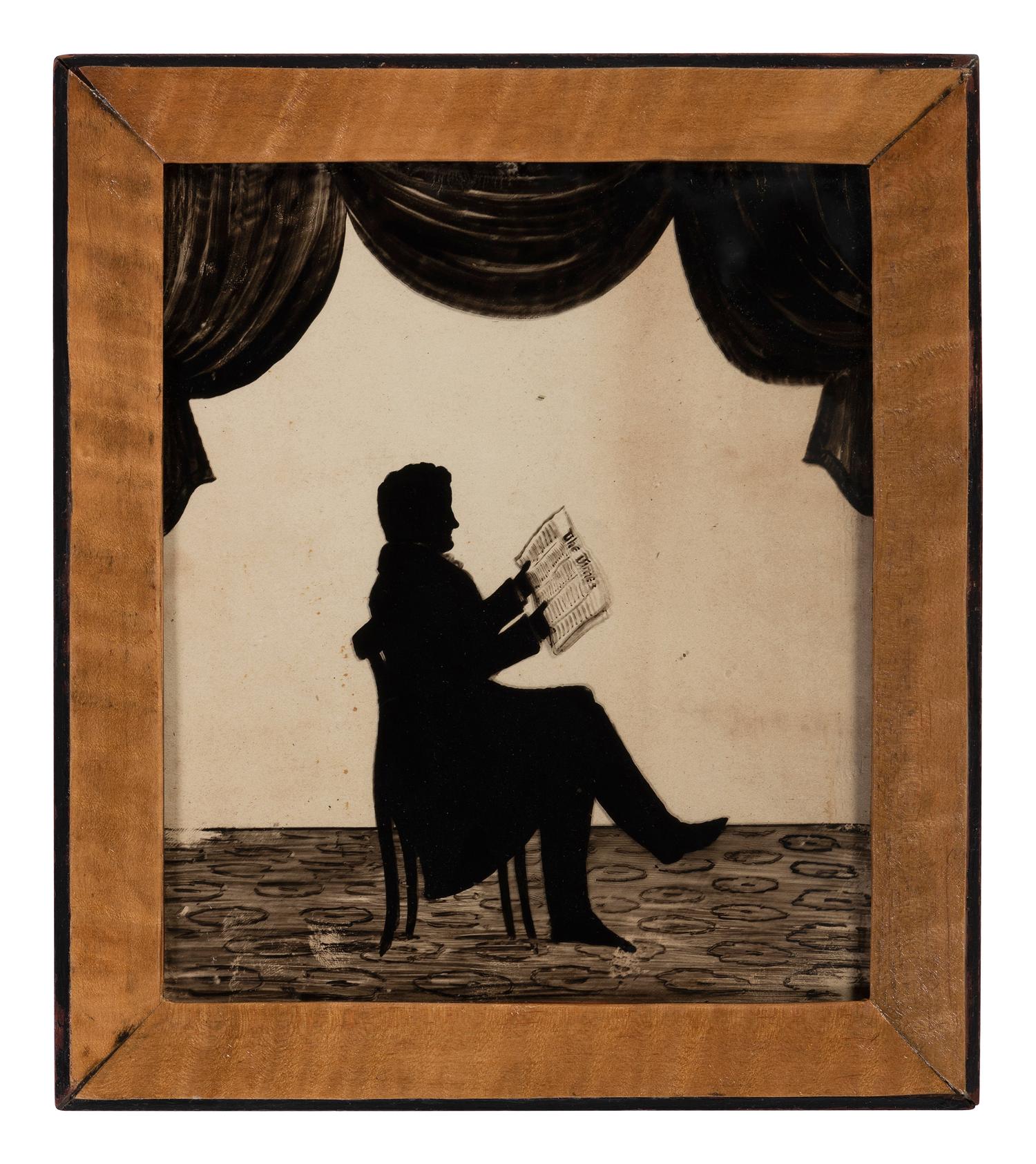 A Reverse Glass Painted Silhouette of a Gentleman Reading
