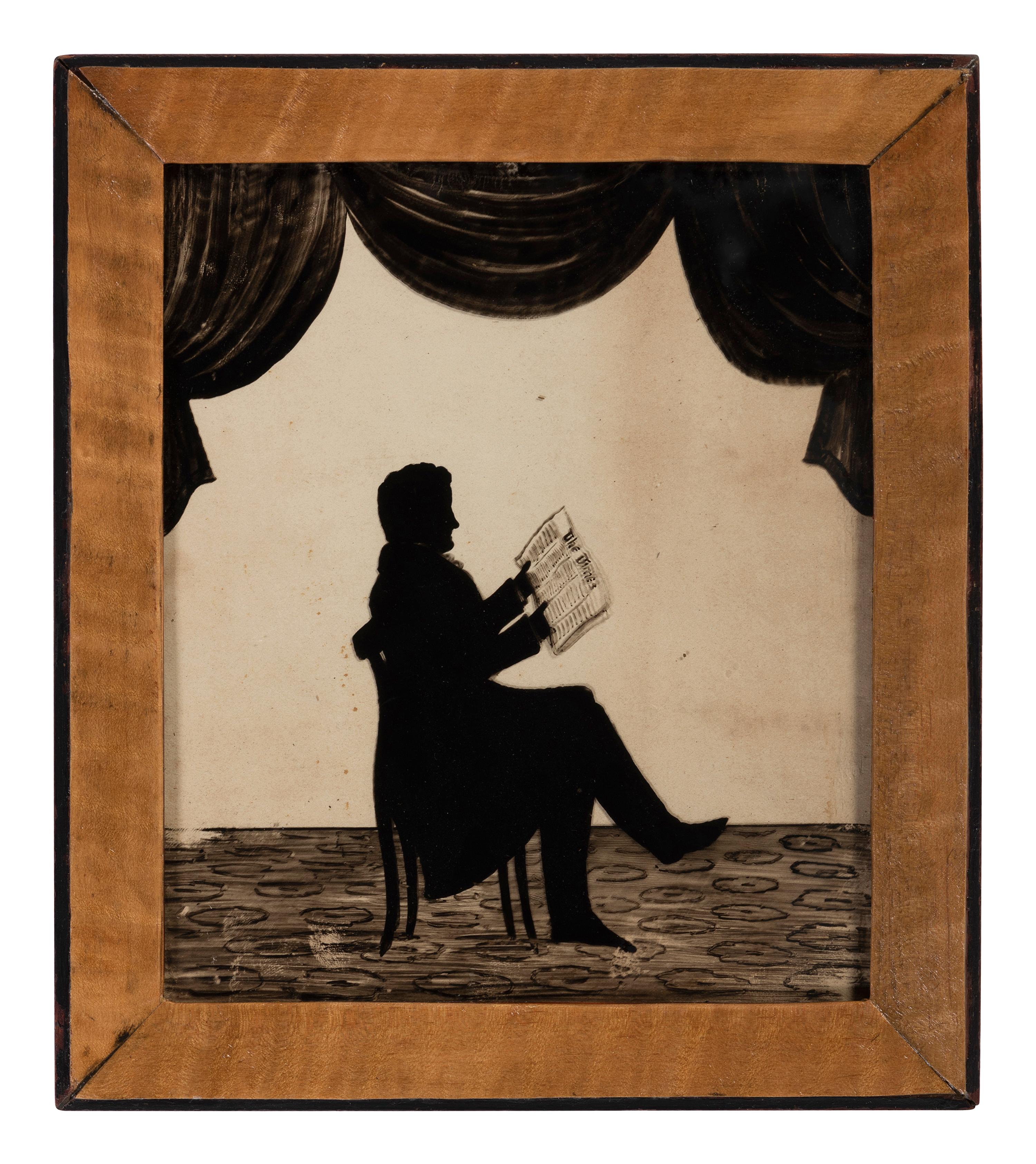 A Reverse Glass Painted Silhouette of a Gentleman Reading