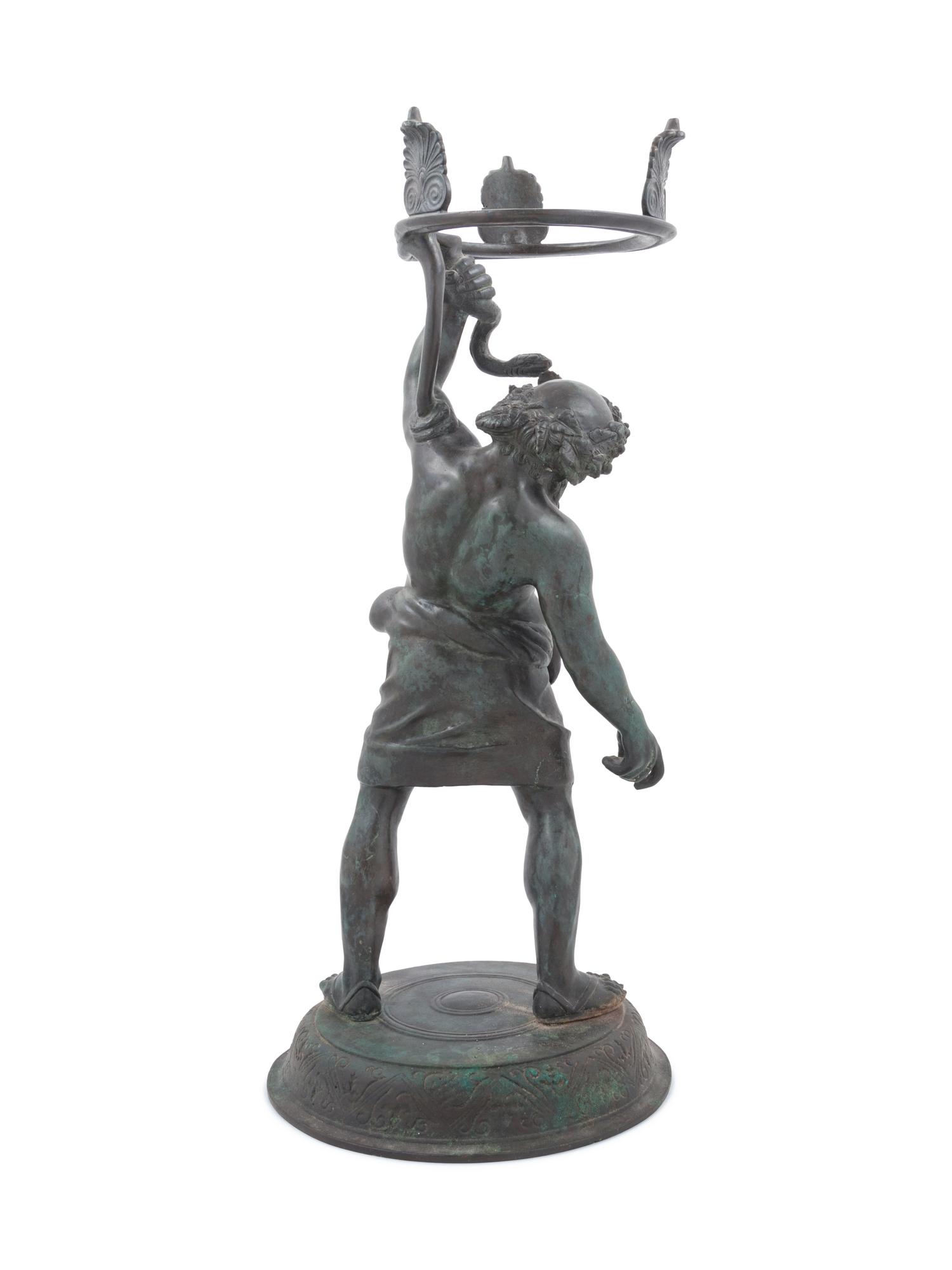 A Grand Tour Patinated Metal Figure of Silenus