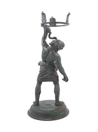 A Grand Tour Patinated Metal Figure of Silenus