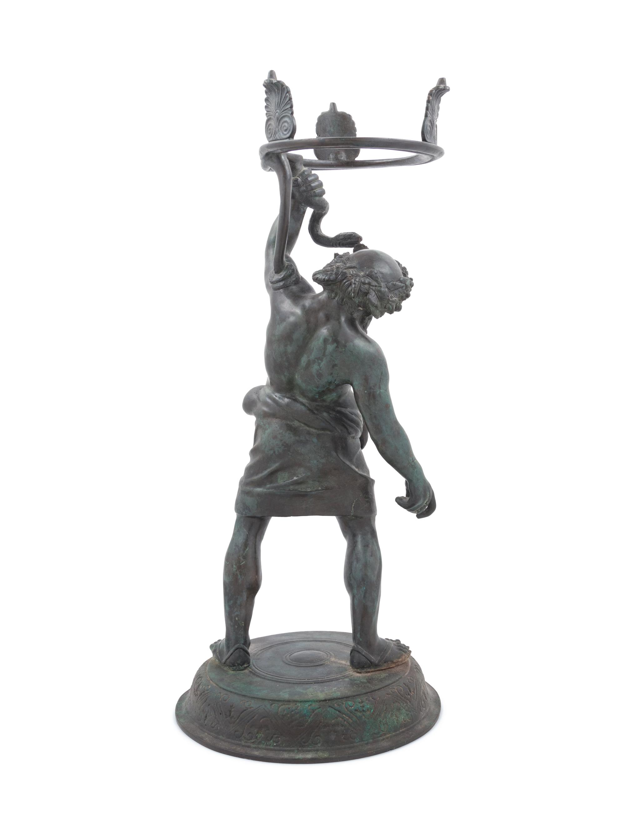 A Grand Tour Patinated Metal Figure of Silenus