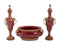 An Assembled French Gilt Metal Mounted Porcelain and Pottery Garniture