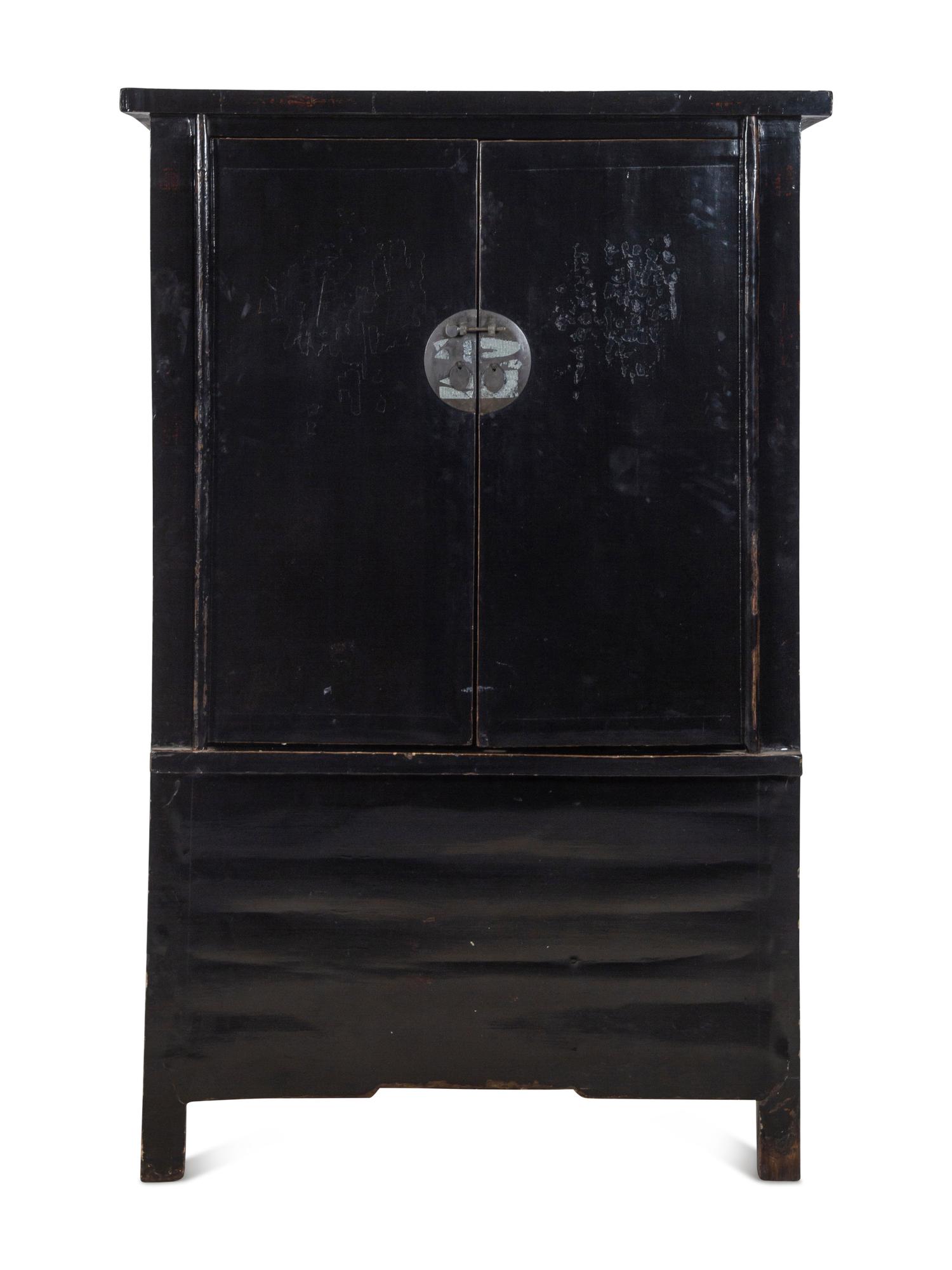 A Chinese Black Lacquered Elm Cabinet