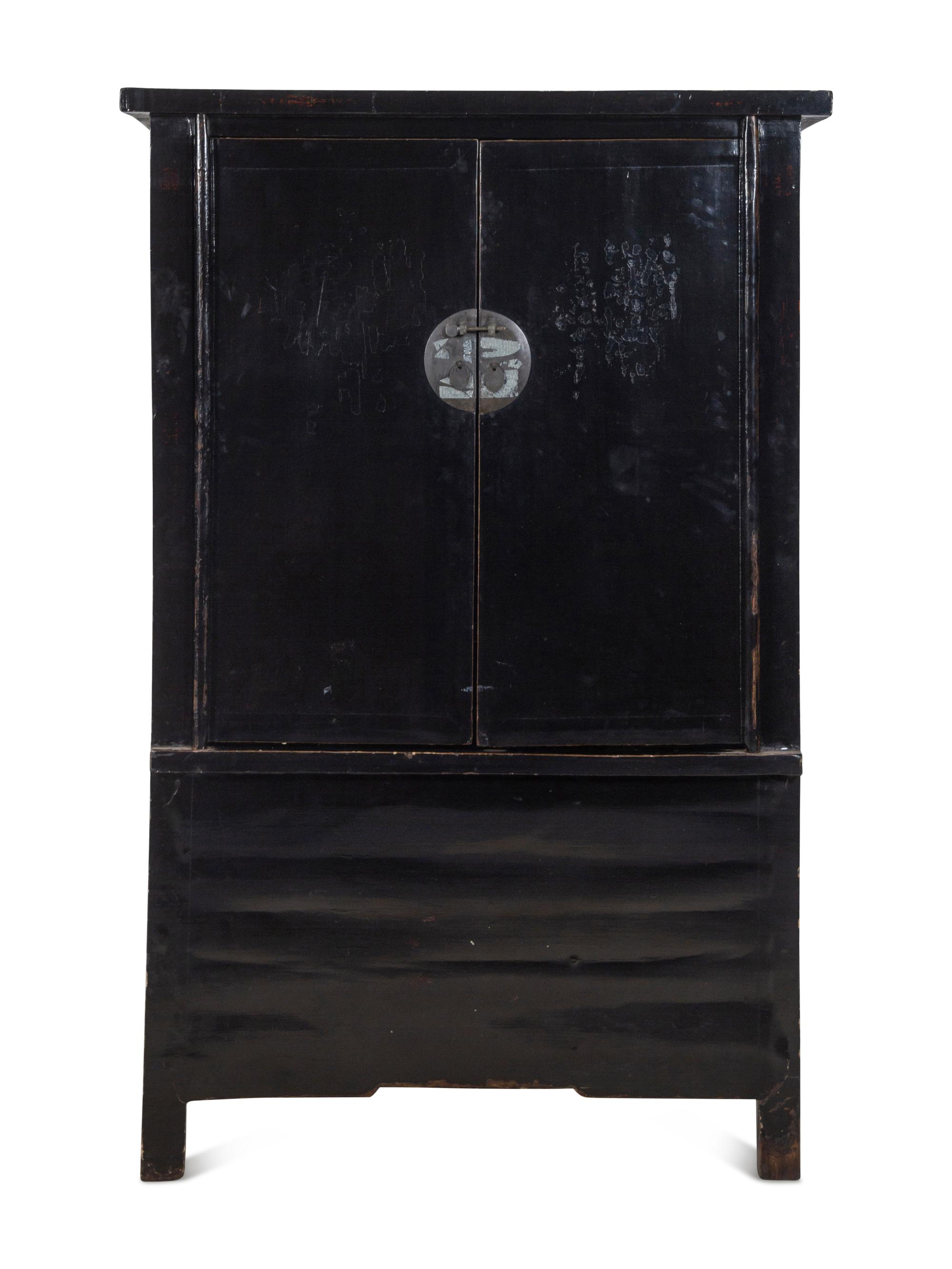 A Chinese Black Lacquered Elm Cabinet