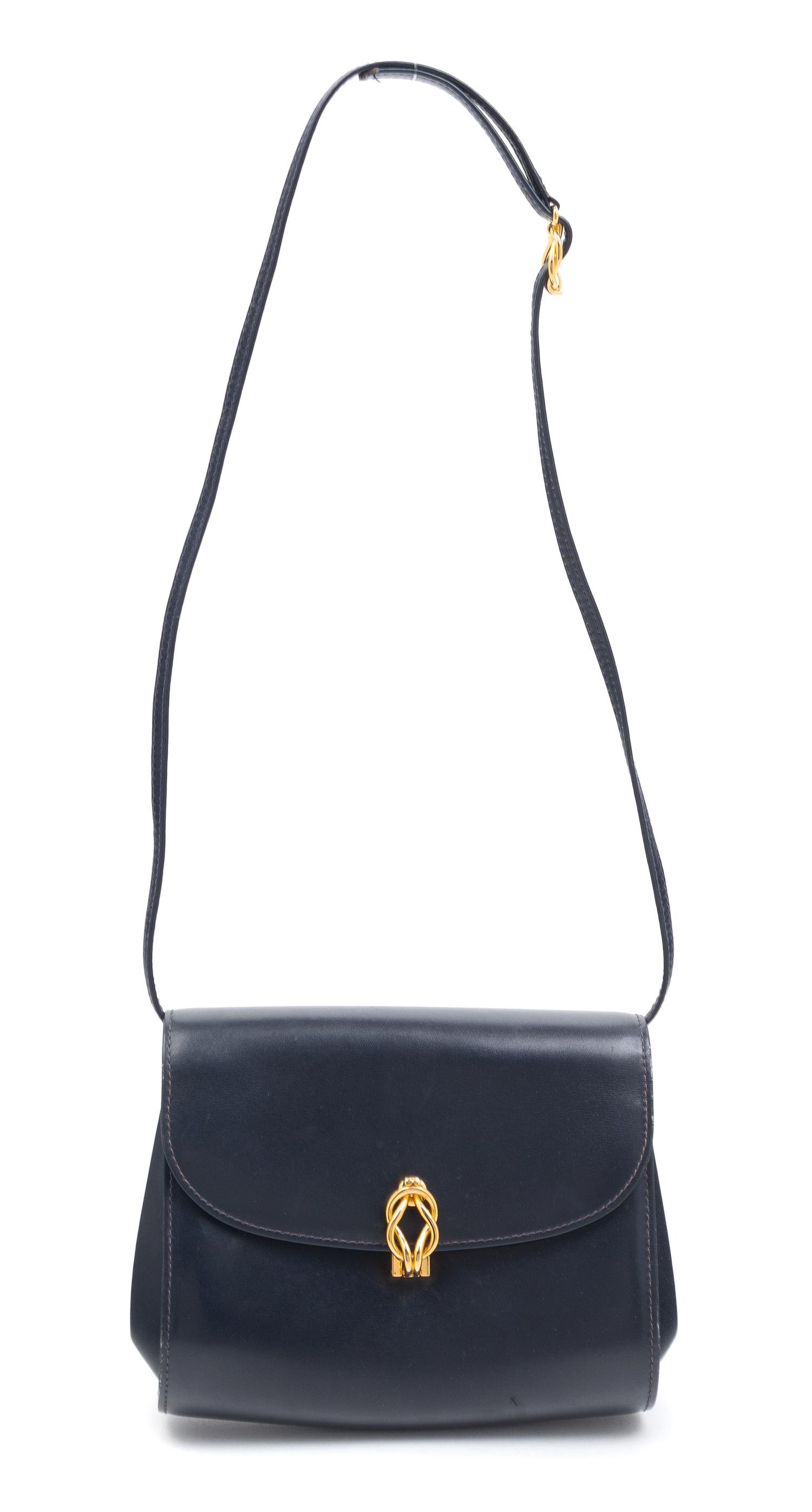 A Gucci Navy Handbag, 6.5" x 7.5" x 3".