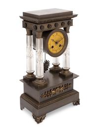 An Empire Style Bronze and Cut Glass Mantel Clock