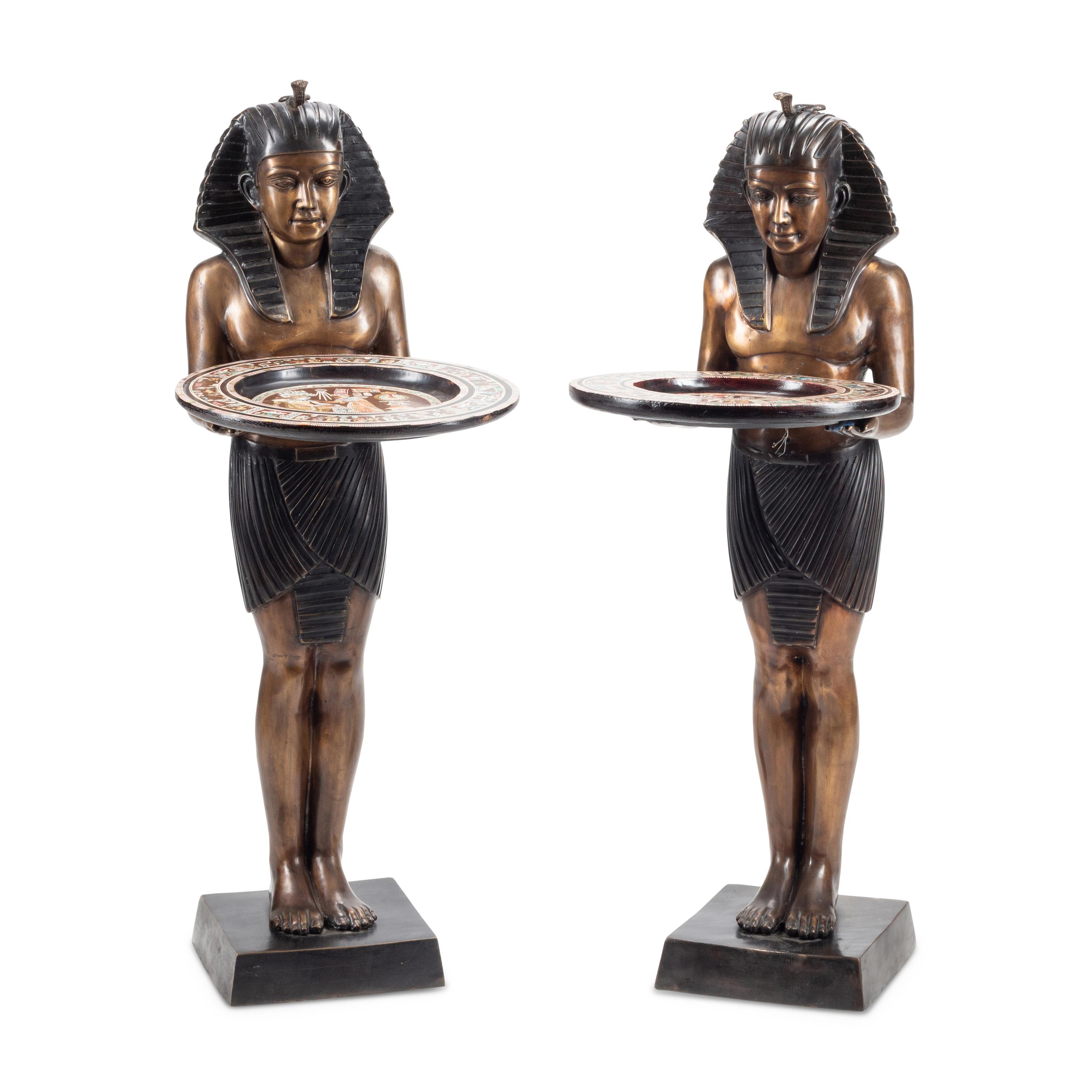 A Pair of Patinated Bronze Egyptian Figures with Marquetry Trays