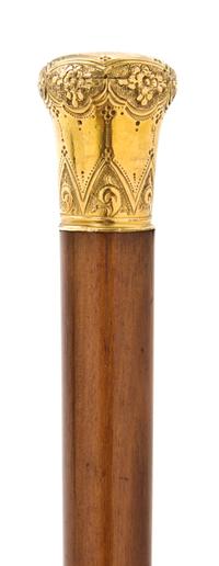 An American Chased Gold Filled Handled Walking Stick, Length of handle 1 1/2 x length overall 32 3/4 inches.