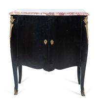 A Transitional Louis XV/XVI Style Gilt Bronze Mounted Ebonized Marble-Top Commode