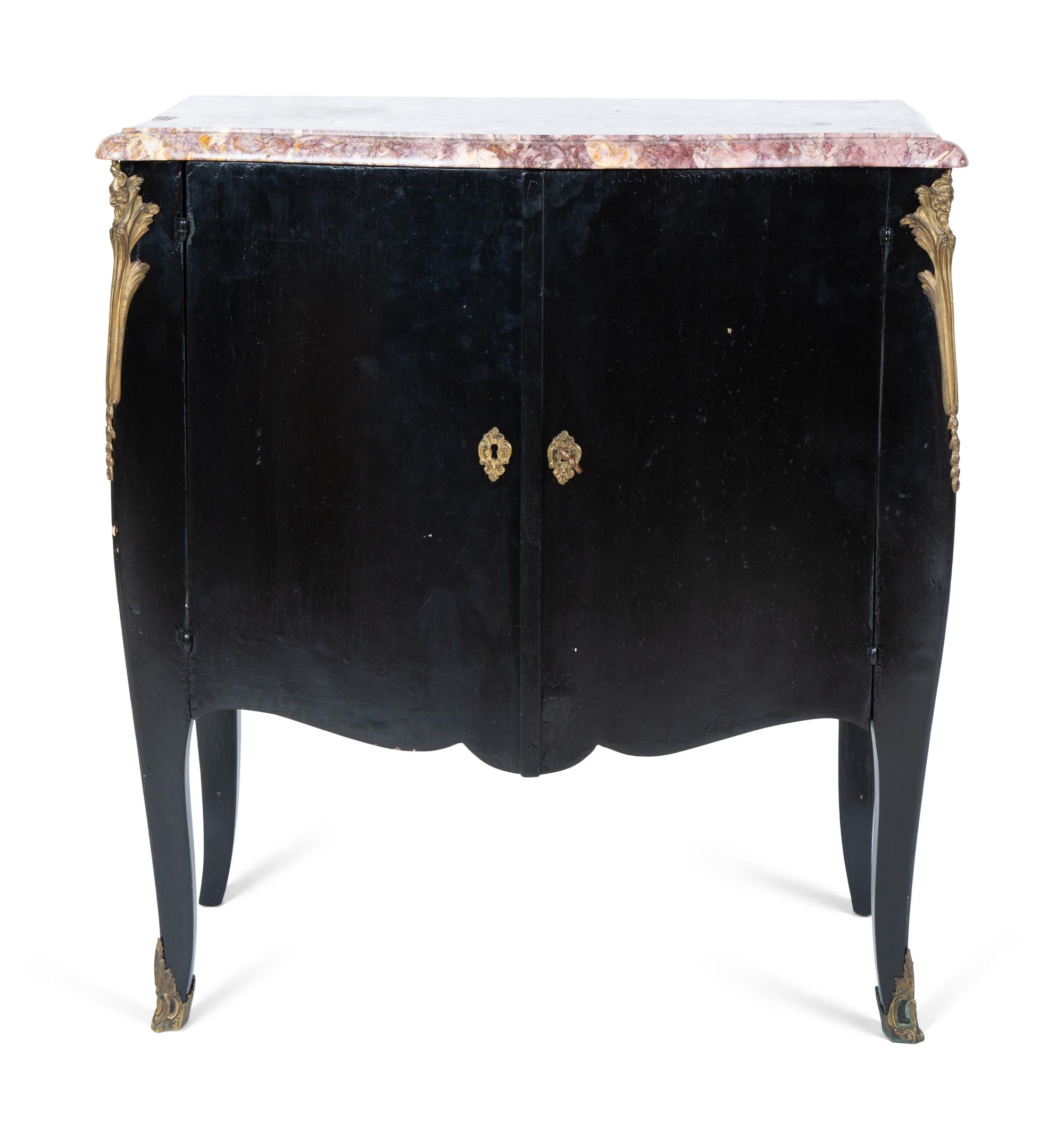 A Transitional Louis XV/XVI Style Gilt Bronze Mounted Ebonized Marble-Top Commode