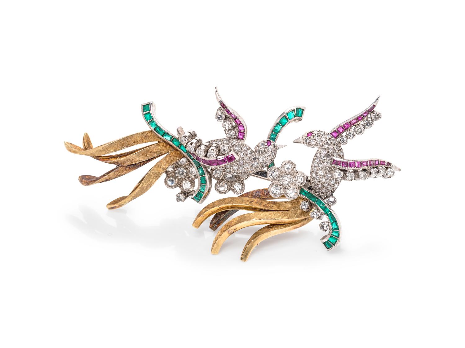 A Pair of Platinum, Yellow Gold, Diamond, Ruby and Emerald Bird Brooches,