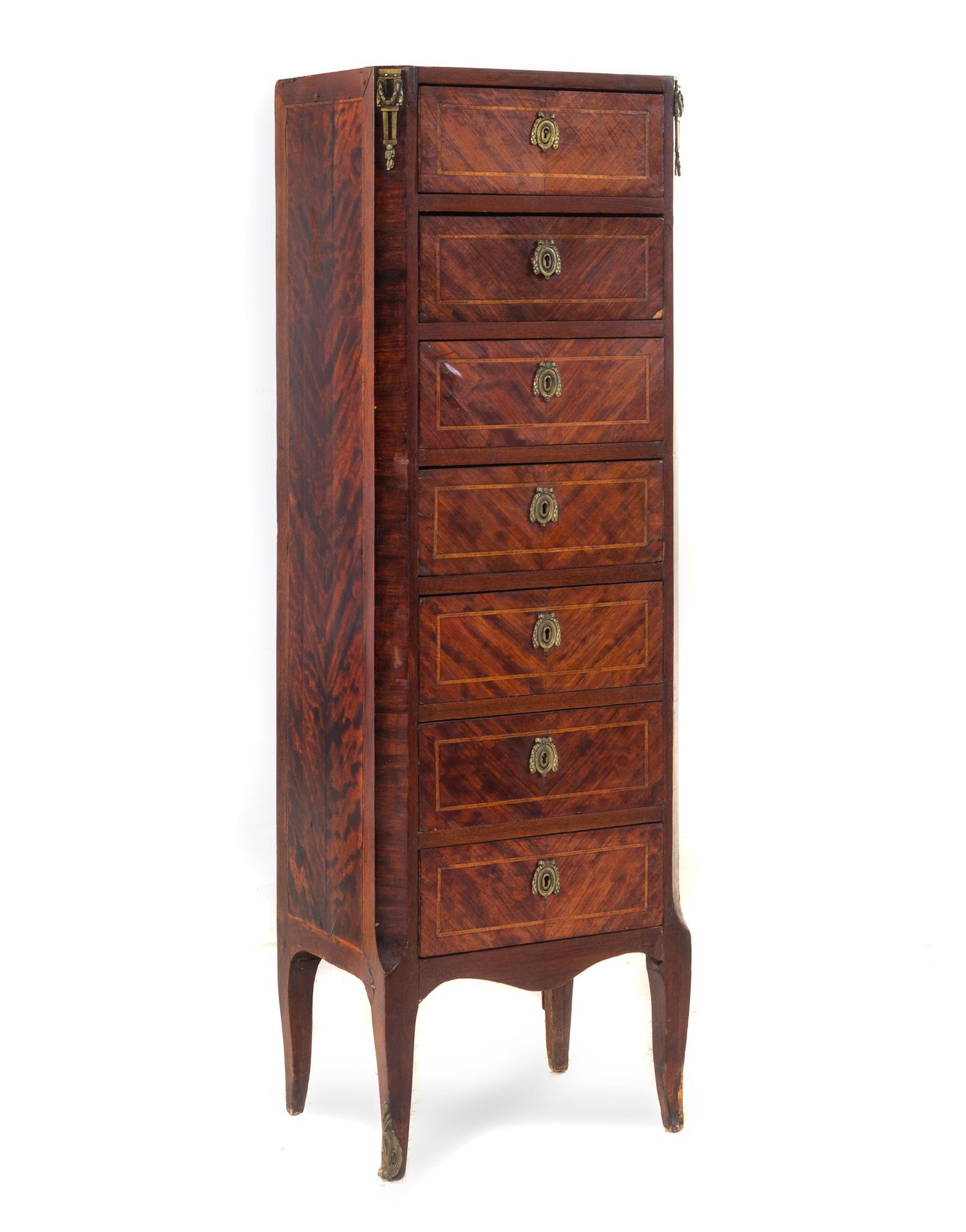 A Transitional Gilt Metal Mounted Mahogany Semainier