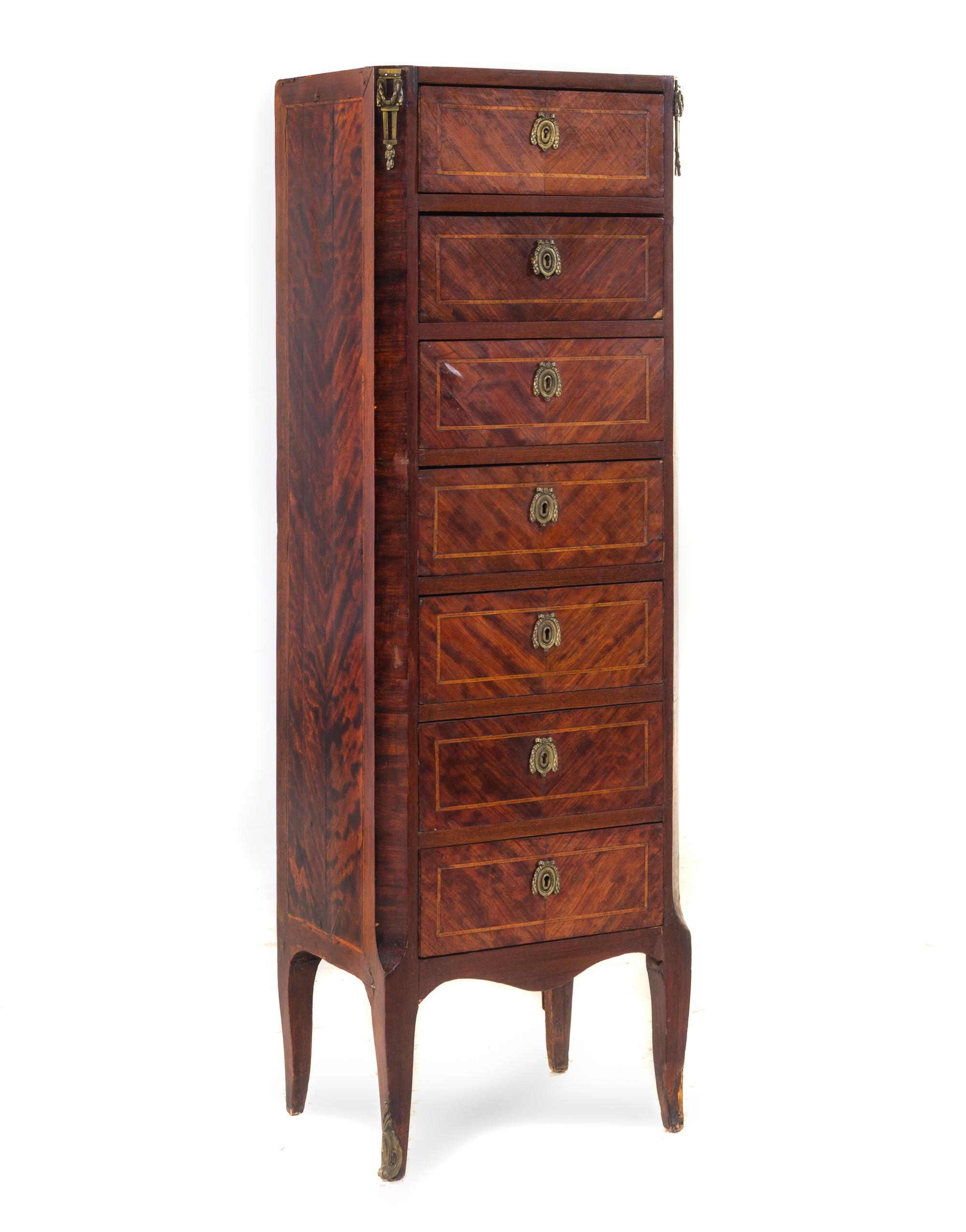 A Transitional Gilt Metal Mounted Mahogany Semainier