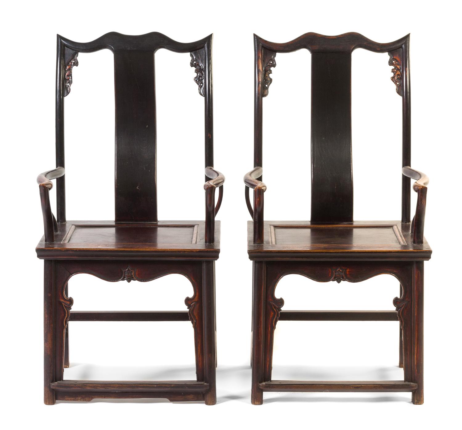 A Pair of Chinese Lacquered Elmwood Official's Hat Armchairs, Sichutouguanmaoyi Height 44 3/4 inches.