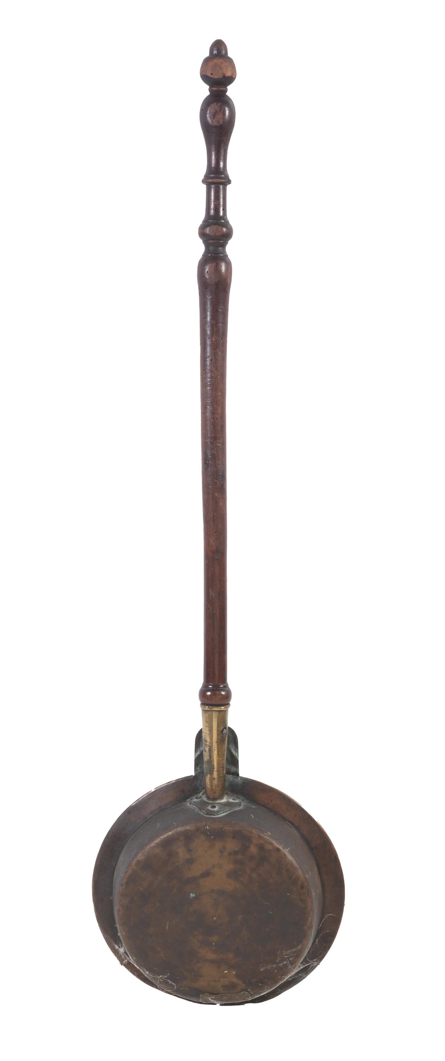 An English Engraved Brass and Turned Walnut Bed Warmer